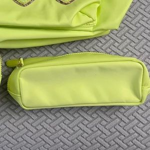 Stoney Clover Lane lime slim pouch NWOT